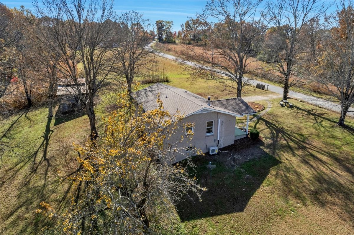 390 Junus Jackson Hollow Road Minor Hill, TN 38473 - Photo 29 of 38 a view of a house with a yard