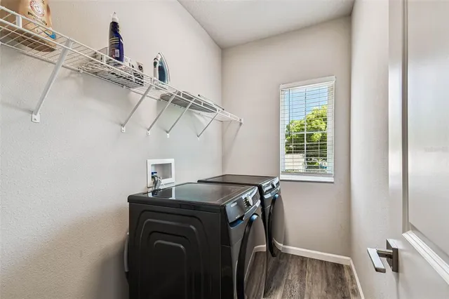 a utility room with dryer and washer