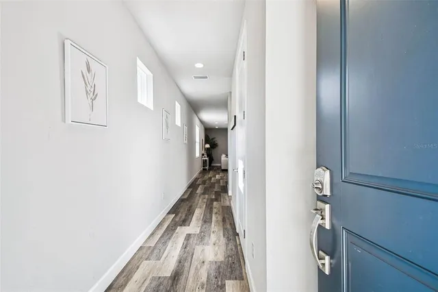 a view of hallway with stairs