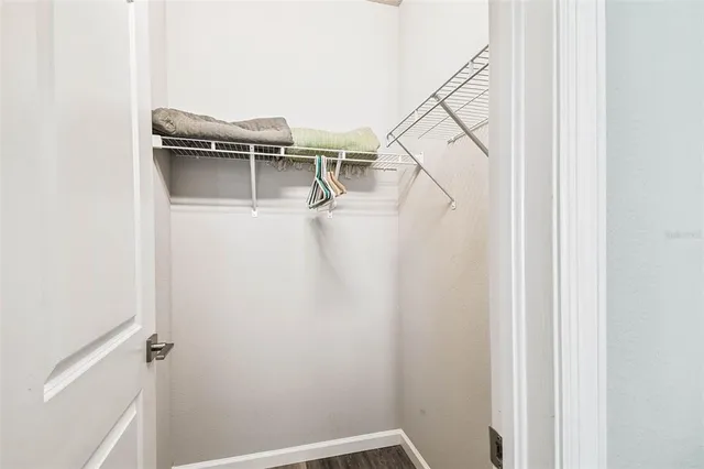 a view of a room with white walls