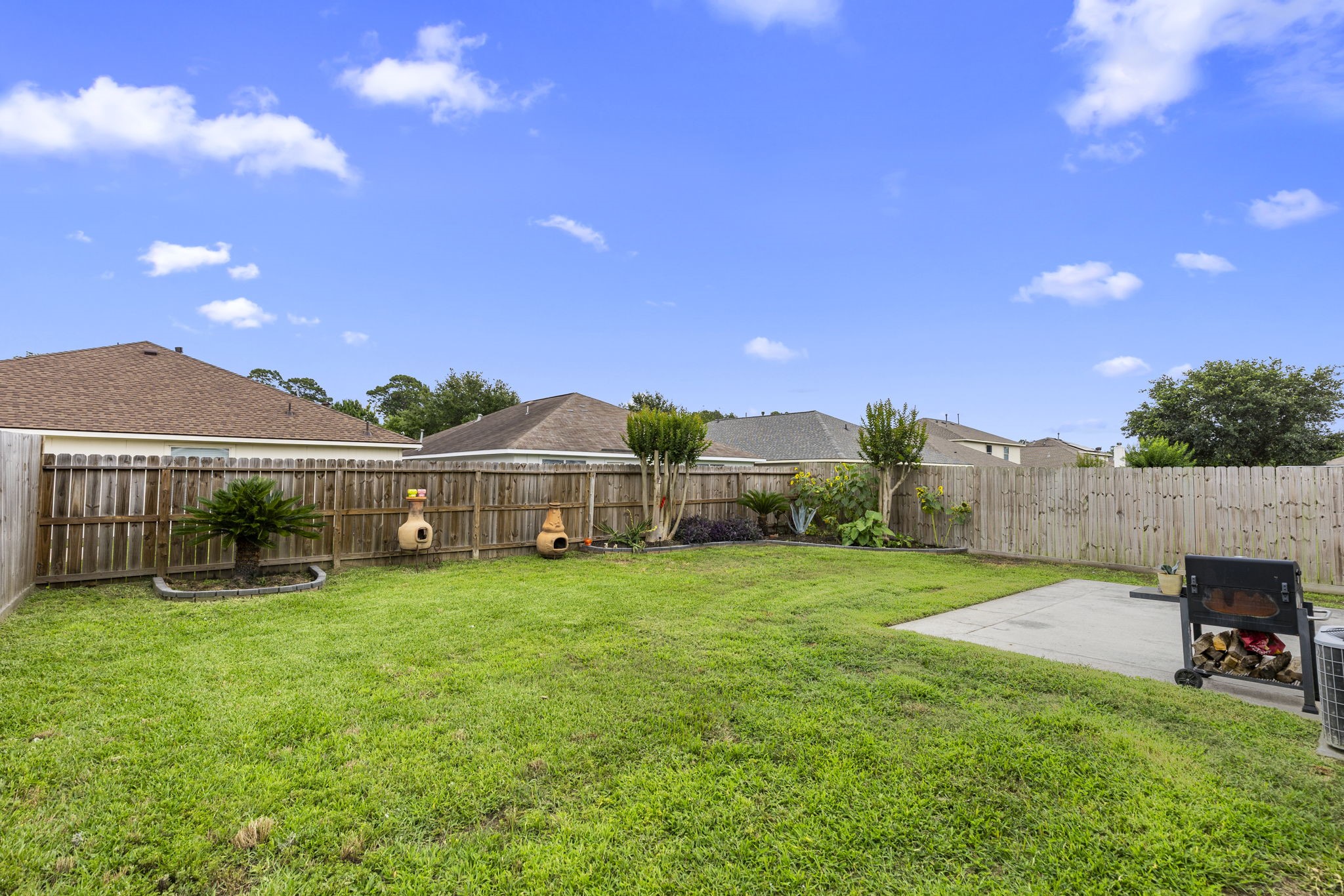 29106 Foxingham Circle Spring, TX 77386 - Photo 30 of 47 a view of a house with a yard and sitting area