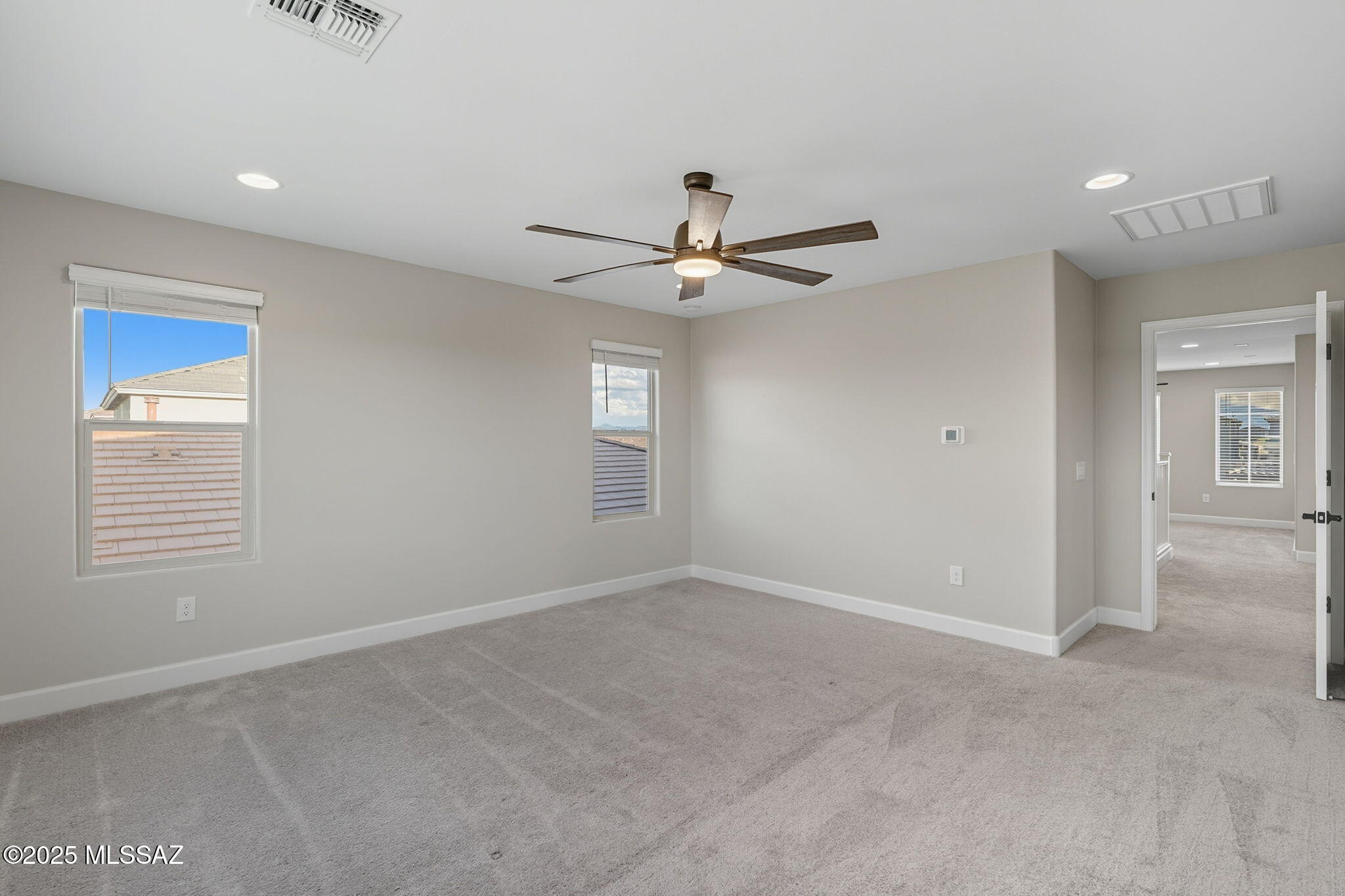 12100 East Ryscott Circle Vail, AZ 85641 - Photo 27 of 53 a view of an empty room with a window