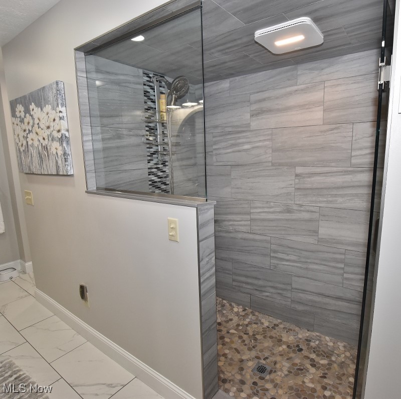 1251 Arrowhead Drive Southwest Dellroy, OH 44620 - Photo 27 of 50 Custom tiled oversized tiles & glass shower is amazing
