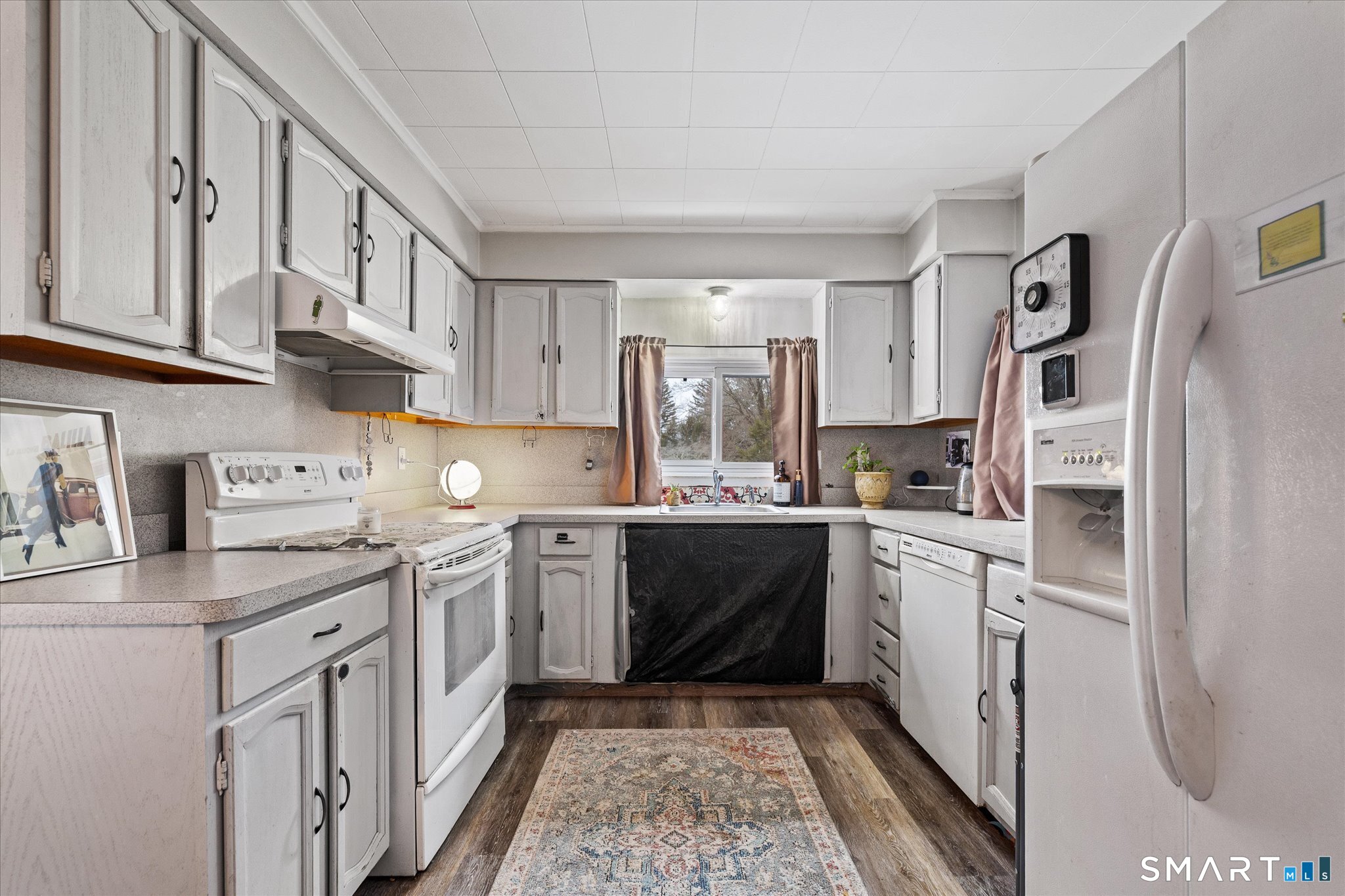 119 Quercus Avenue Windham, CT 06226 - Photo 15 of 30 a kitchen with cabinets and stainless steel appliances