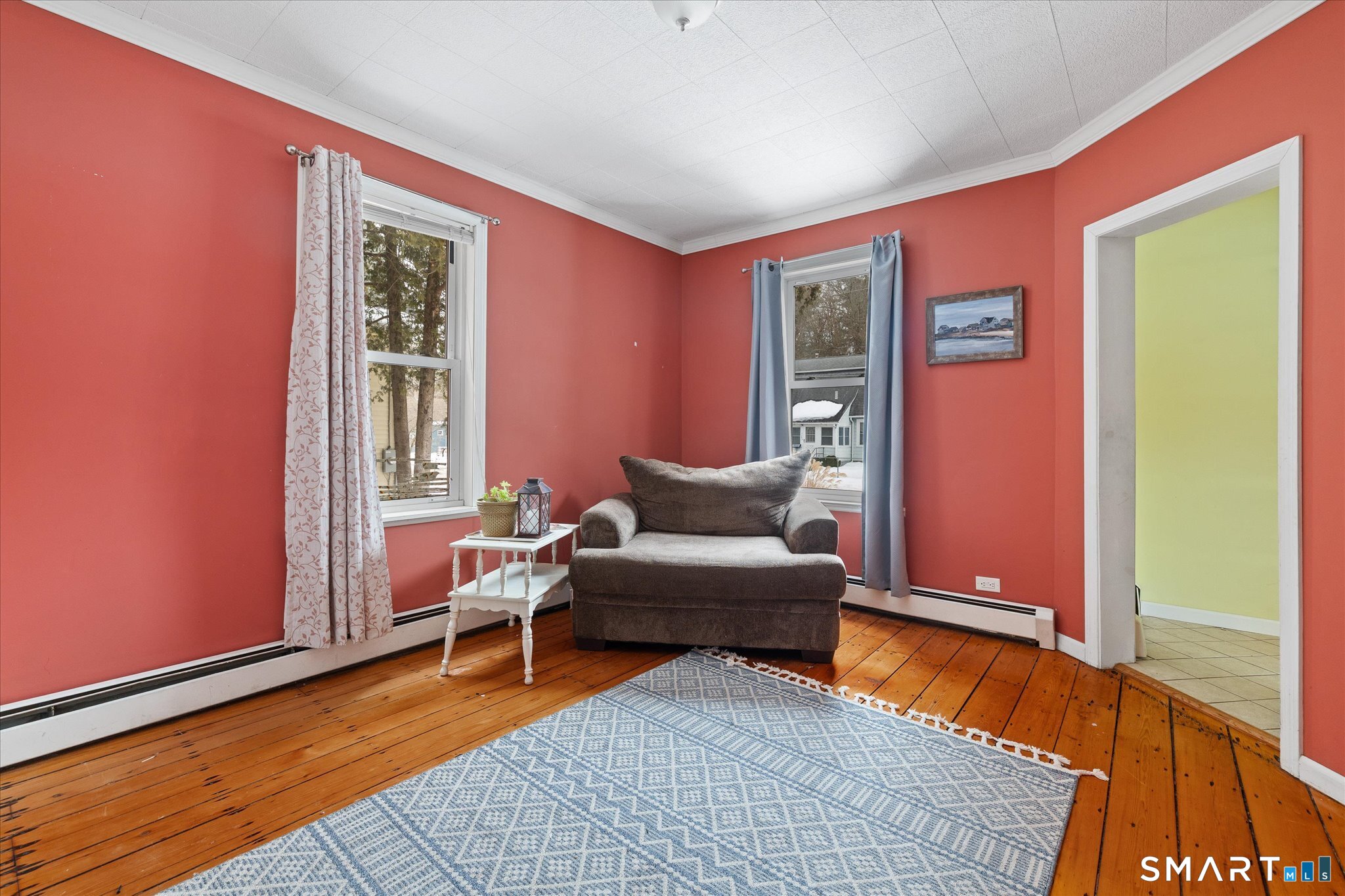 119 Quercus Avenue Windham, CT 06226 - Photo 18 of 30 a living room with furniture a window and a rug