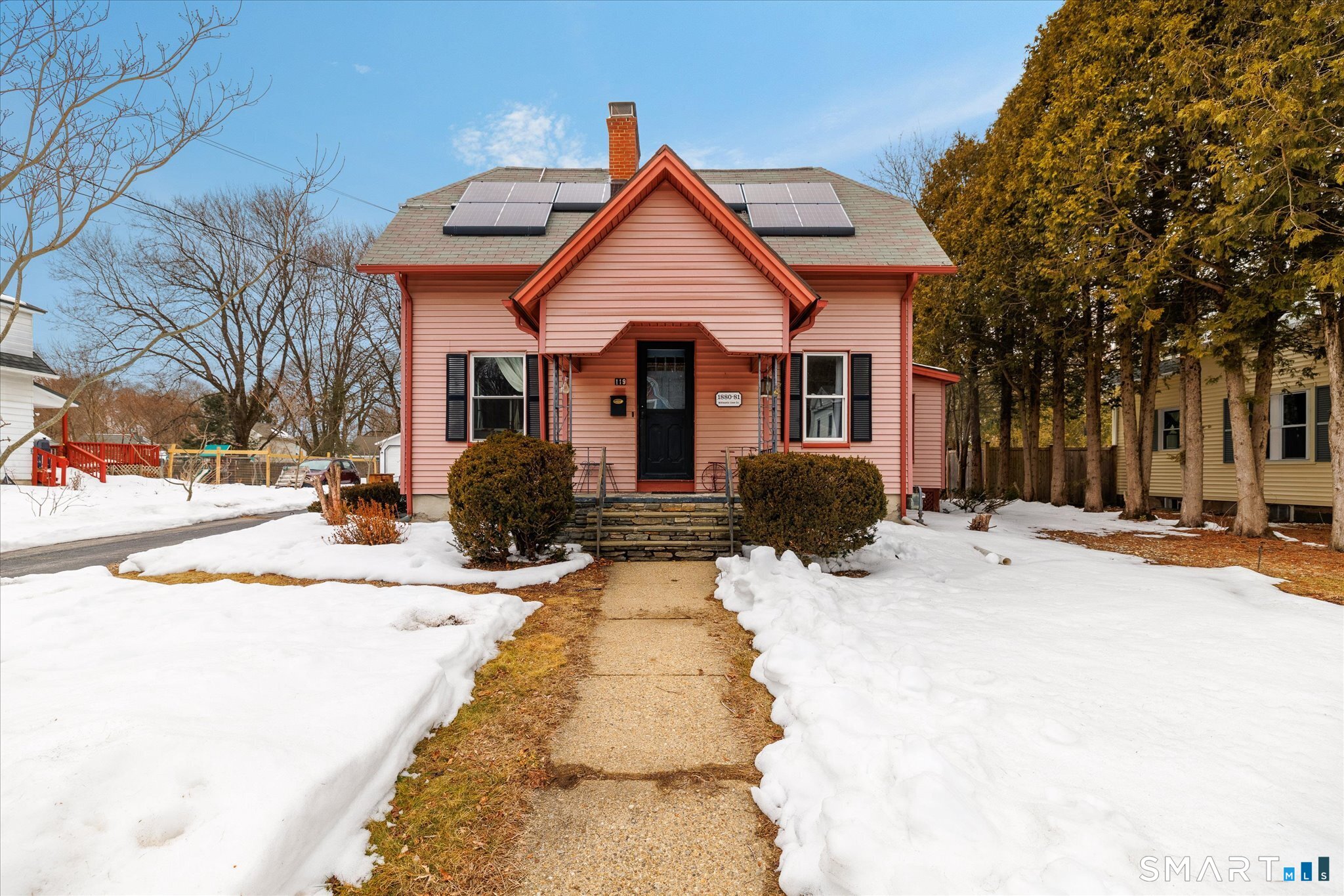 119 Quercus Avenue Windham, CT 06226 - Photo 2 of 30 a view of a white house with a large tree in front of it