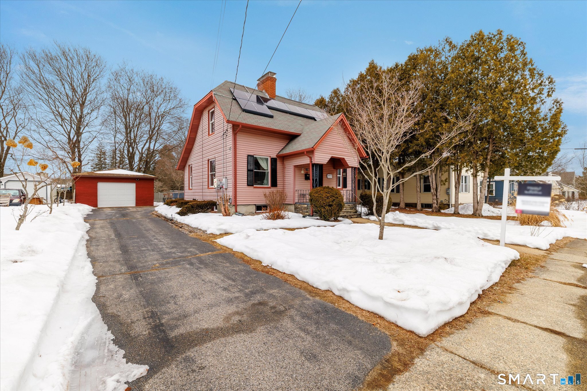 119 Quercus Avenue Windham, CT 06226 - Photo 3 of 30 a view of a white house with a snow on the road