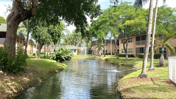 a view of swimming pool with a patio