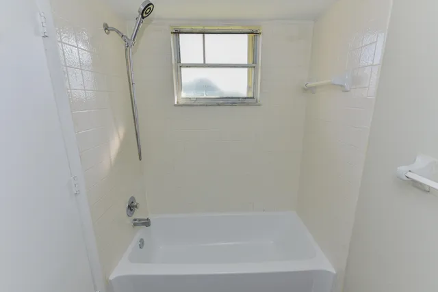 a close view of a bathtub in bathroom