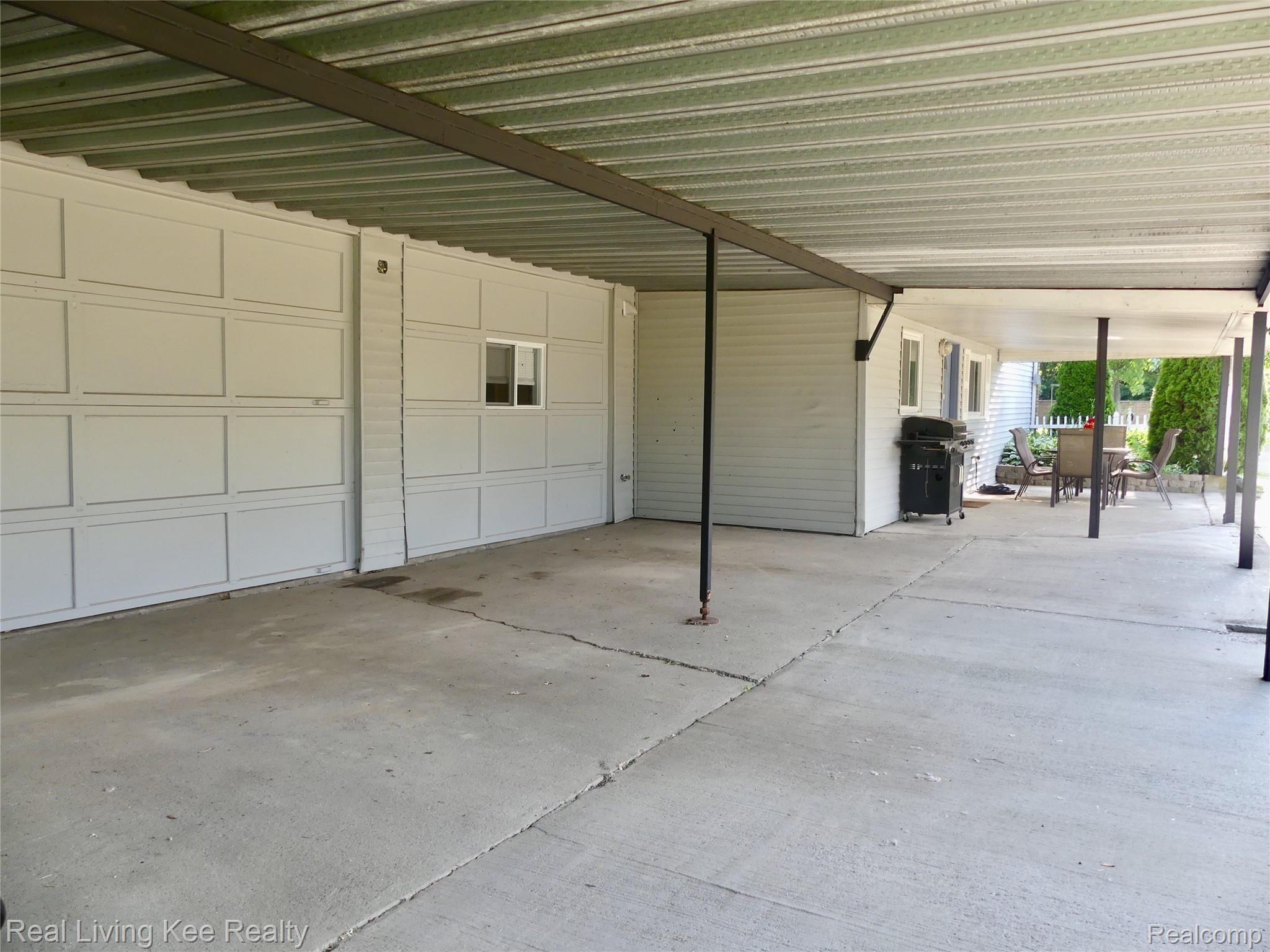 2889 Alexander Street Rochester, MI 48309 - Photo 28 of 30 Extra large double carport and patio