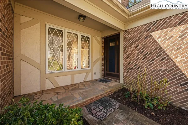 a view of a livingroom with a ceiling fan and a rug