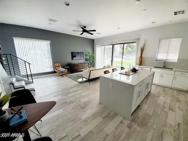 a very nice looking living room with a large window