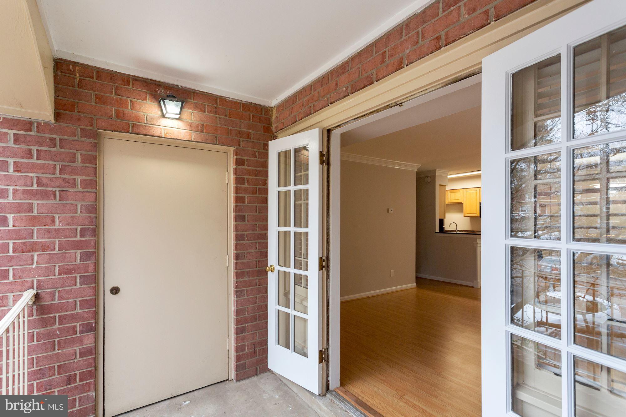 8110 E Colony Point Road, Unit 218 Springfield, VA 22152 - Photo 28 of 40 HVAC closet-Double French Doors