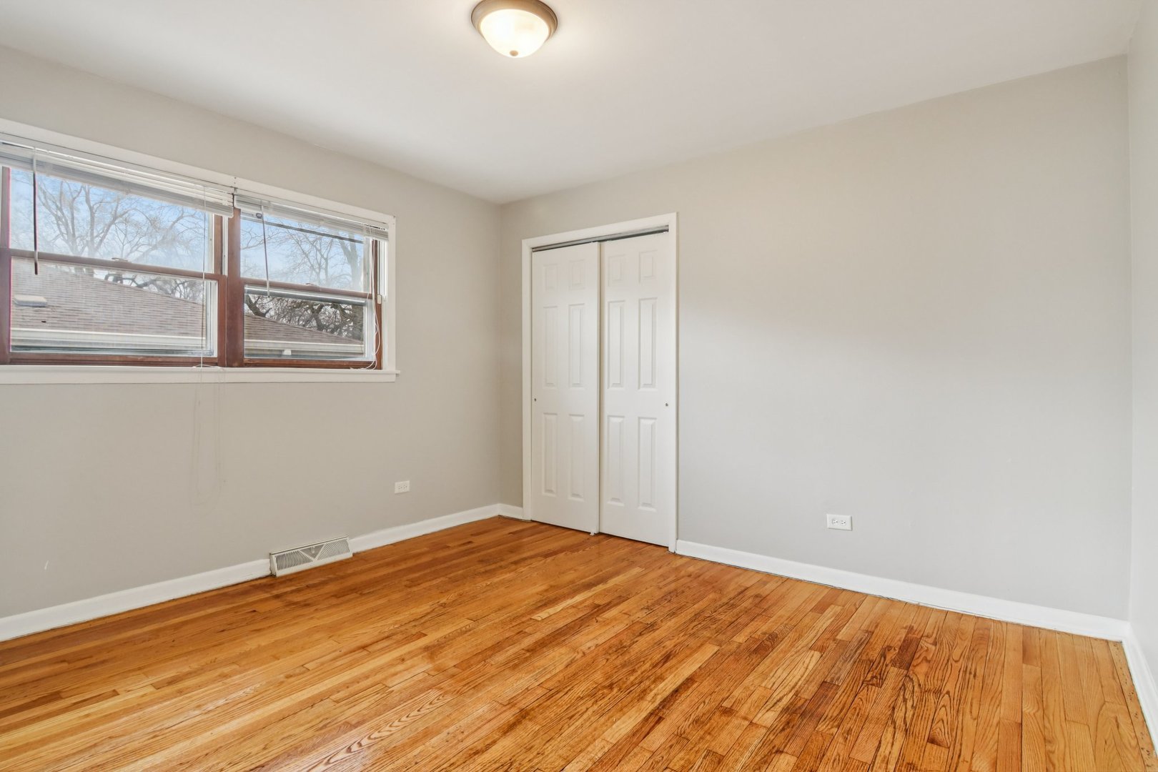 270 Madison Avenue Calumet City, IL 60409 - Photo 17 of 34 a view of empty room with wooden floor