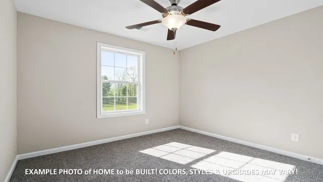 a bathroom with a sink a toilet and a window