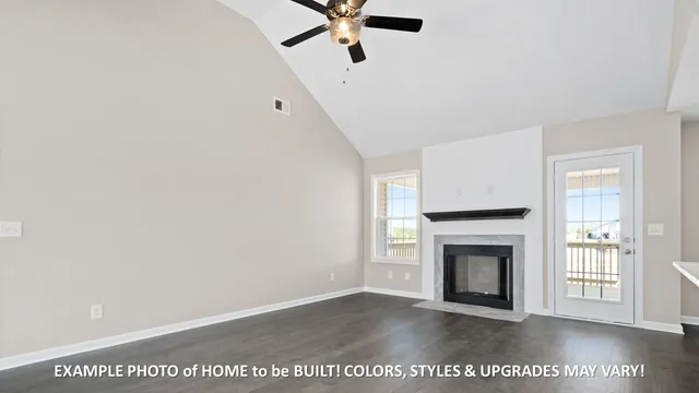 a view of empty room with fireplace
