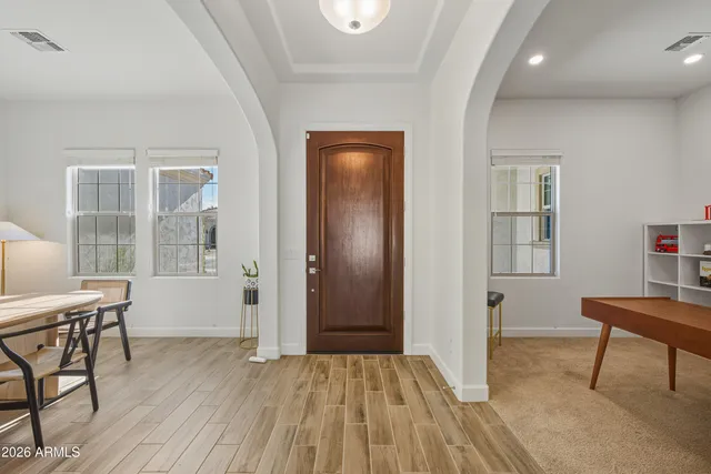 a view of a livingroom with furniture and wooden floor