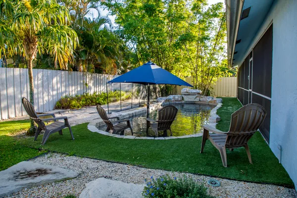 a garden view with a seating space