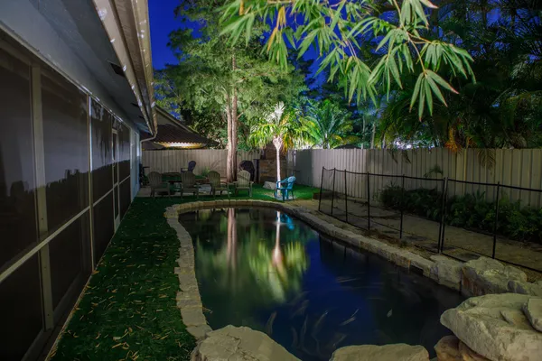 a backyard of a house with lots of green space