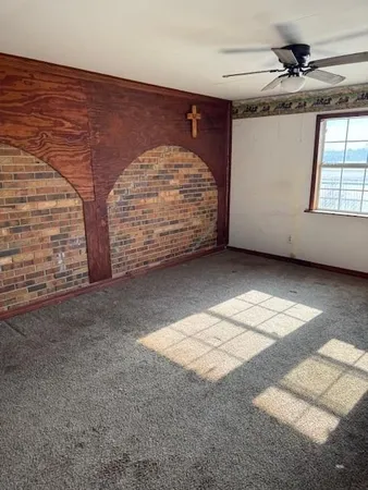 a view of livingroom with an empty space