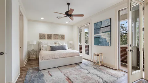 a bathroom with a double vanity sink a mirror and a shower