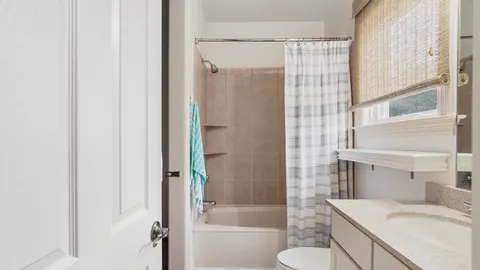 a bathroom with a bathtub