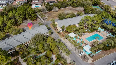 an aerial view of a house with a garden