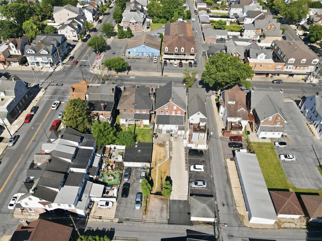 812 Linden Street Bethlehem, PA 18018 - Photo 36 of 39 An aerial perspective reveals a vibrant neighborhood with diverse housing styles and bustling streets.