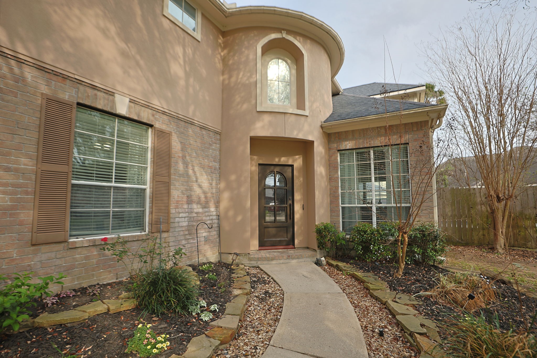 20102 Windbury Court Spring, TX 77379 - Photo 6 of 49 a front view of a house with garden