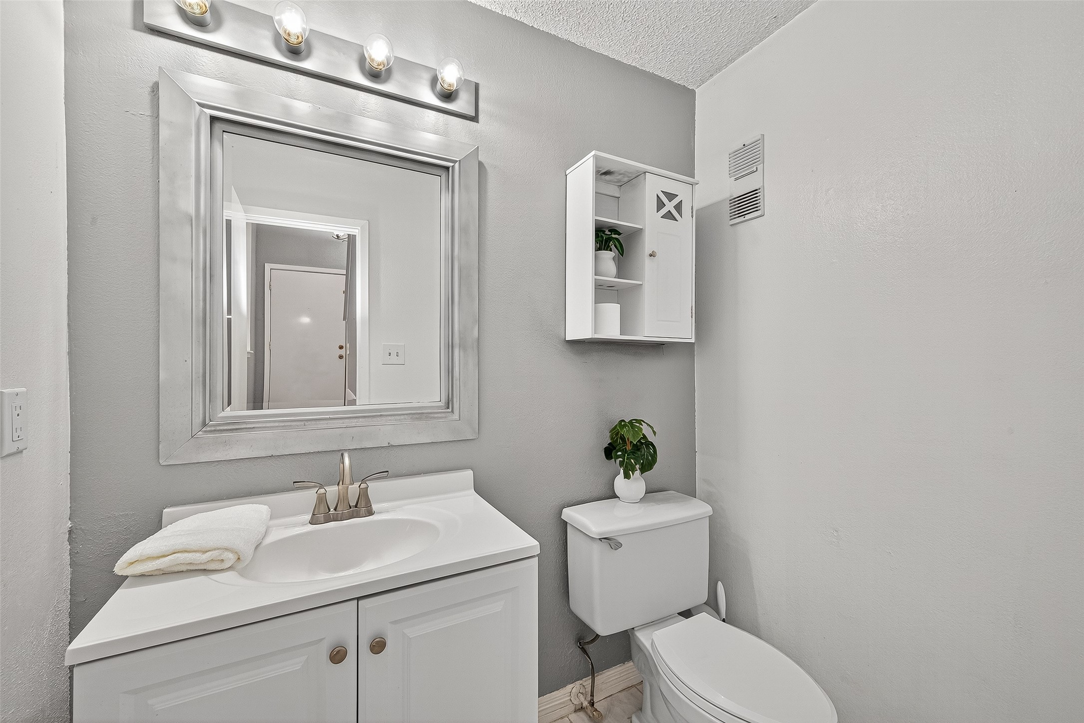 3200 South Gessner Road, Unit 224 Houston, TX 77063 - Photo 13 of 27 Half bathroom is conveniently located downstairs.