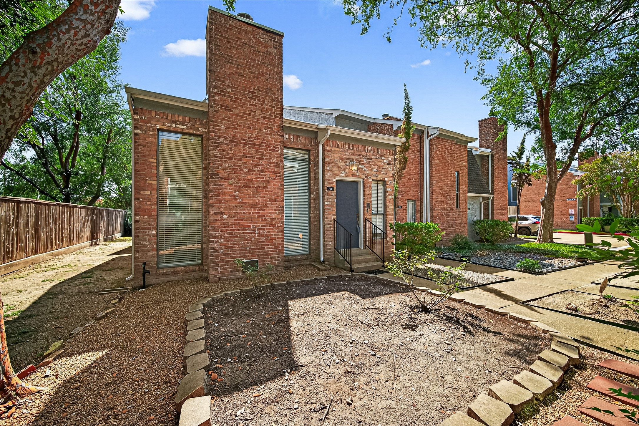 3200 South Gessner Road, Unit 224 Houston, TX 77063 - Photo 2 of 27 Discover your new haven in this charming brick-front end unit.