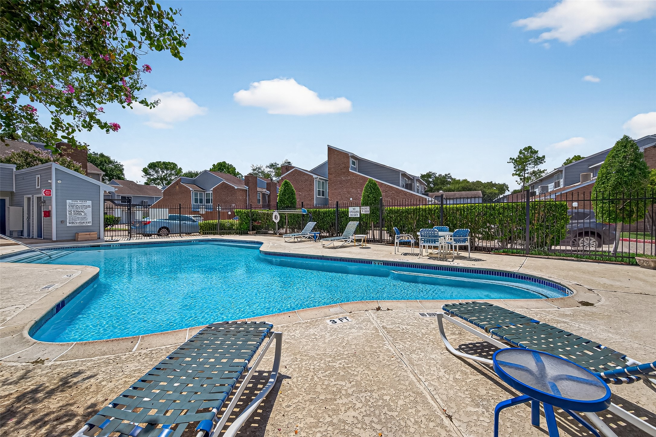 3200 South Gessner Road, Unit 224 Houston, TX 77063 - Photo 3 of 27 Sparkling community pool with plenty of seating for relaxation.