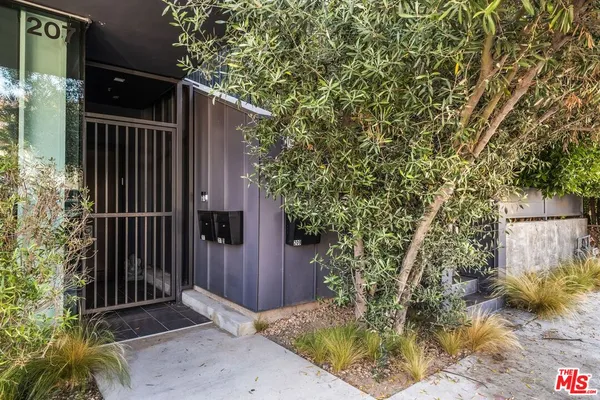 a view of backyard with entertaining space