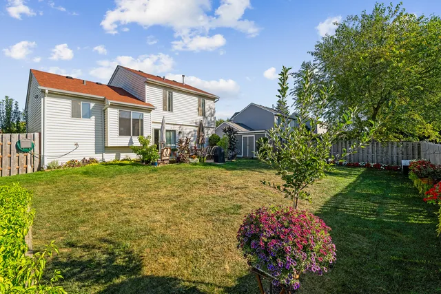a front view of house with yard