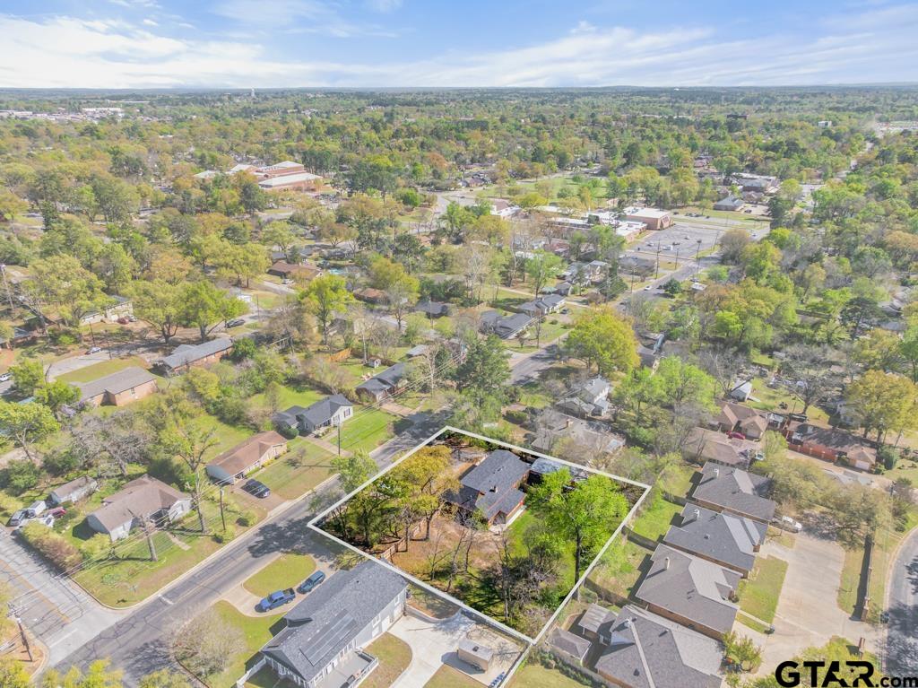 2819 New Copeland Road Tyler, TX 75701 - Photo 38 of 39 an aerial view of residential houses with outdoor space
