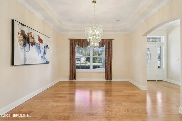 a view of an empty room with a bathroom