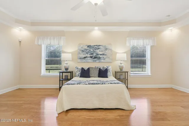 a black and white photo of a living room