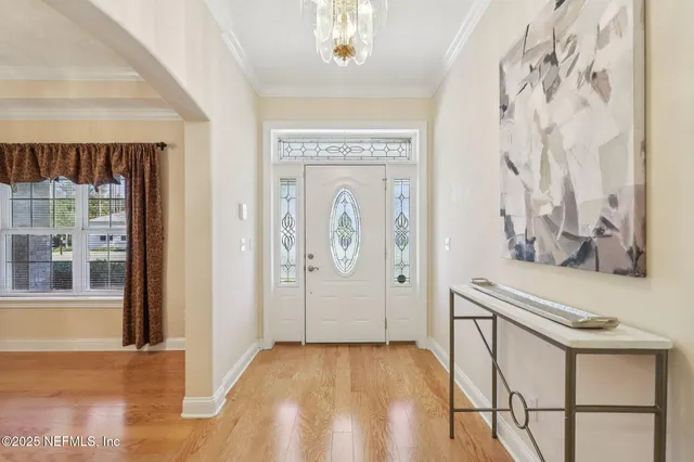 a bathroom with a granite countertop tub sink and mirror