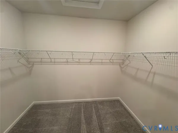 a bathroom with a double vanity sink and mirror