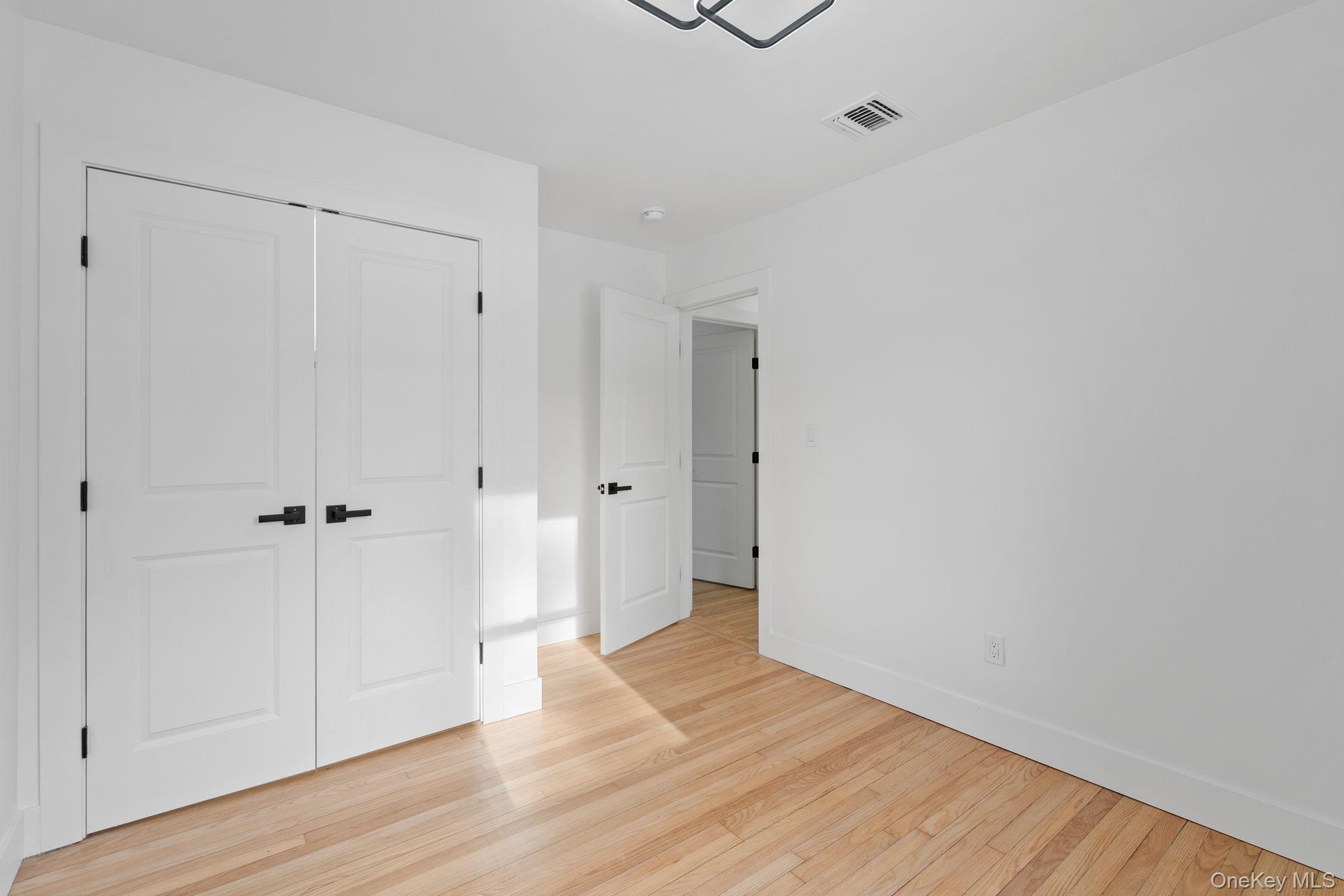 52 Rudolph Road Modena, NY 12548 - Photo 14 of 49 Unfurnished bedroom featuring light wood finished floors and a closet