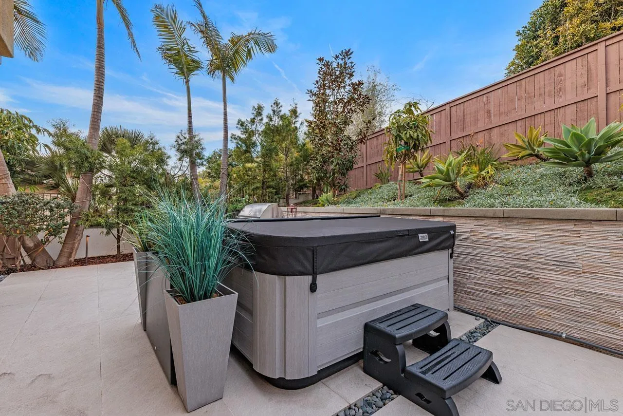 1460 Ravean Court Encinitas, CA 92024 - Photo 62 of 72 a view of a backyard with a tub