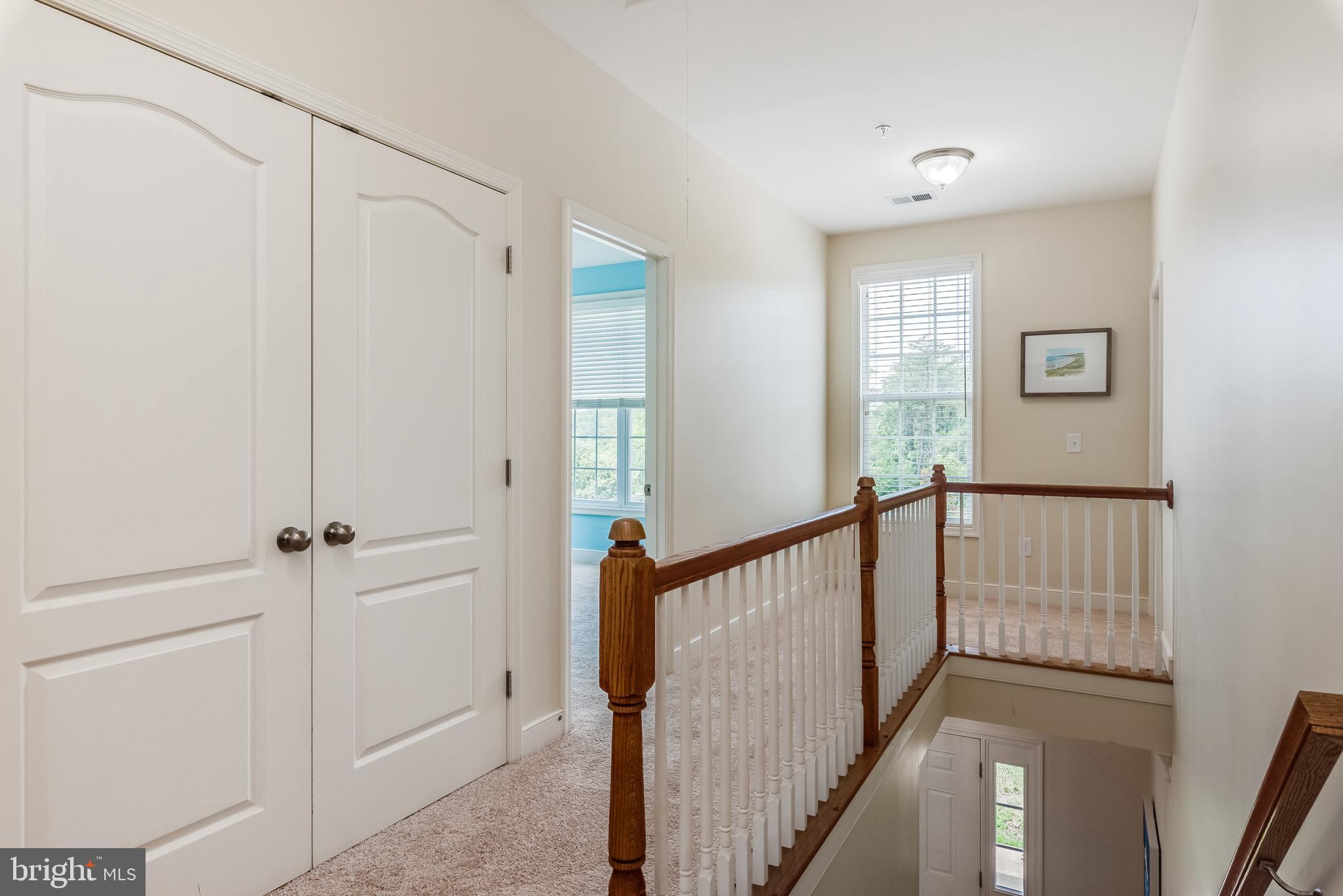 337 Chestnut Road Linthicum Heights, MD 21090 - Photo 44 of 64 a view of a hallway with wooden floor and entryway