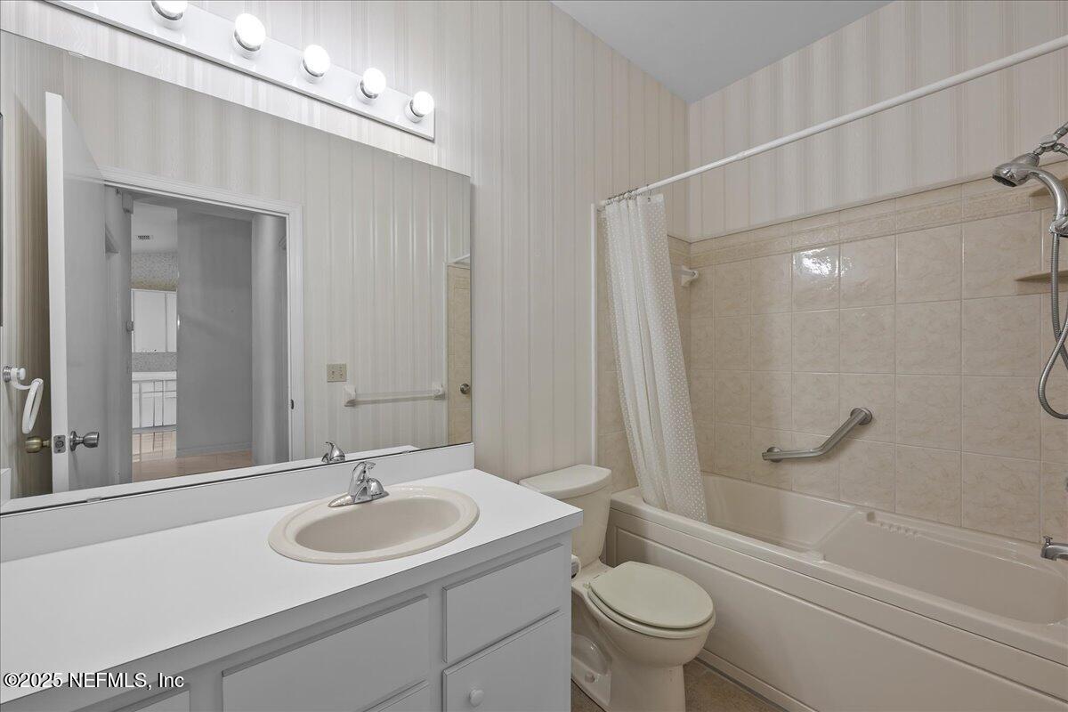 3726 Northwest 53rd Road Gainesville, FL 32653 - Photo 14 of 36 a bathroom with a sink toilet and shower