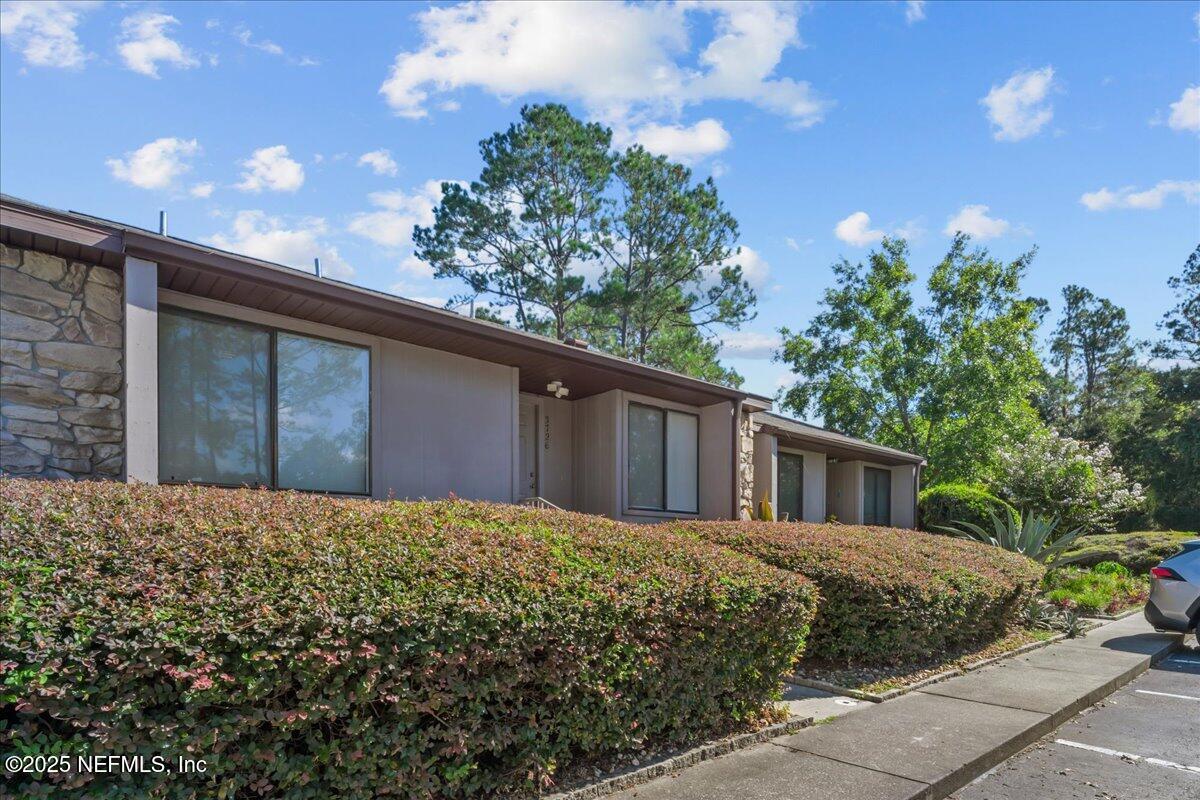 3726 Northwest 53rd Road Gainesville, FL 32653 - Photo 2 of 36 a house view with a backyard space