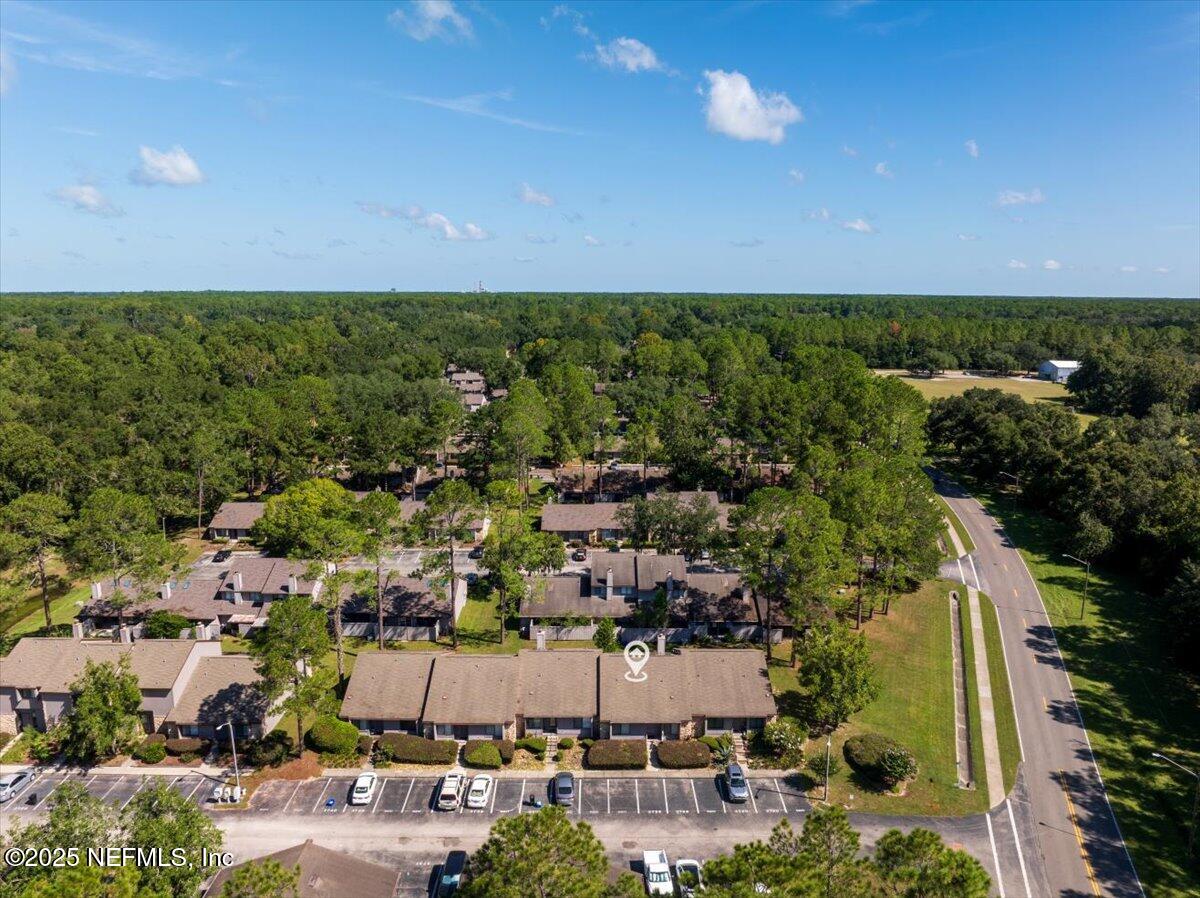 3726 Northwest 53rd Road Gainesville, FL 32653 - Photo 24 of 36 an aerial view of a houses with a yard