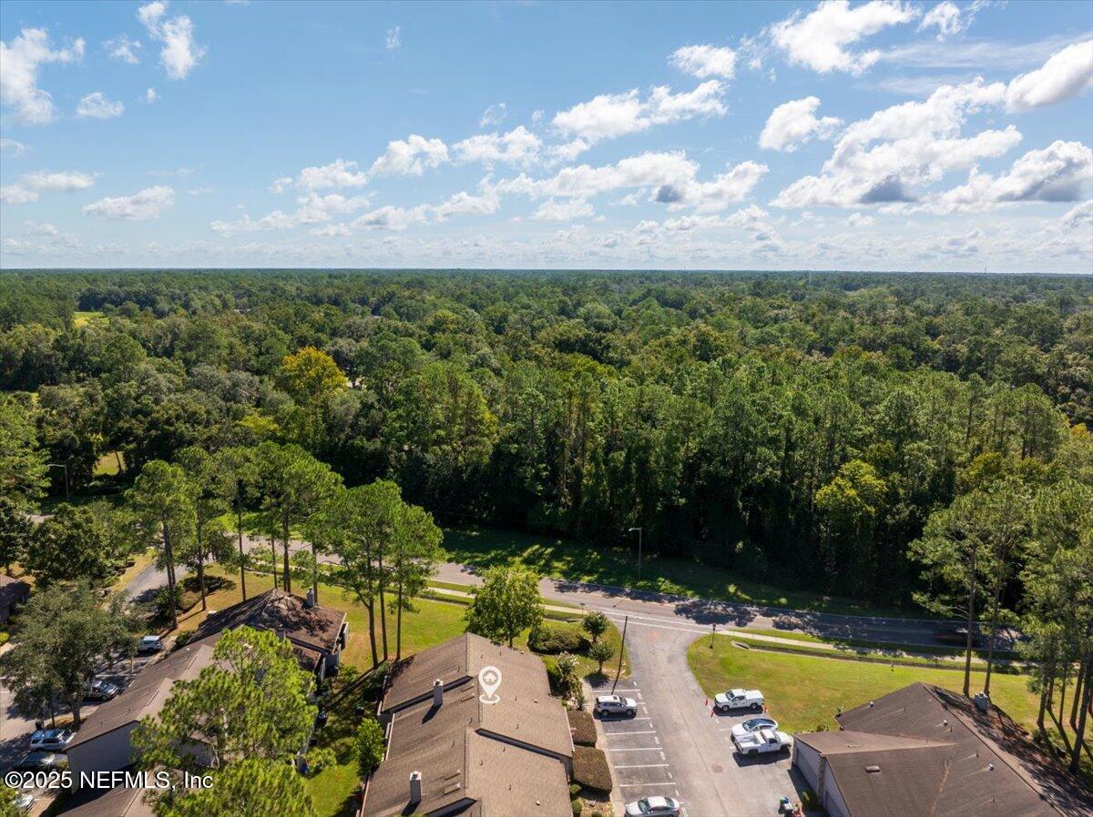 3726 Northwest 53rd Road Gainesville, FL 32653 - Photo 25 of 36 a view of a swimming pool and lounge chair