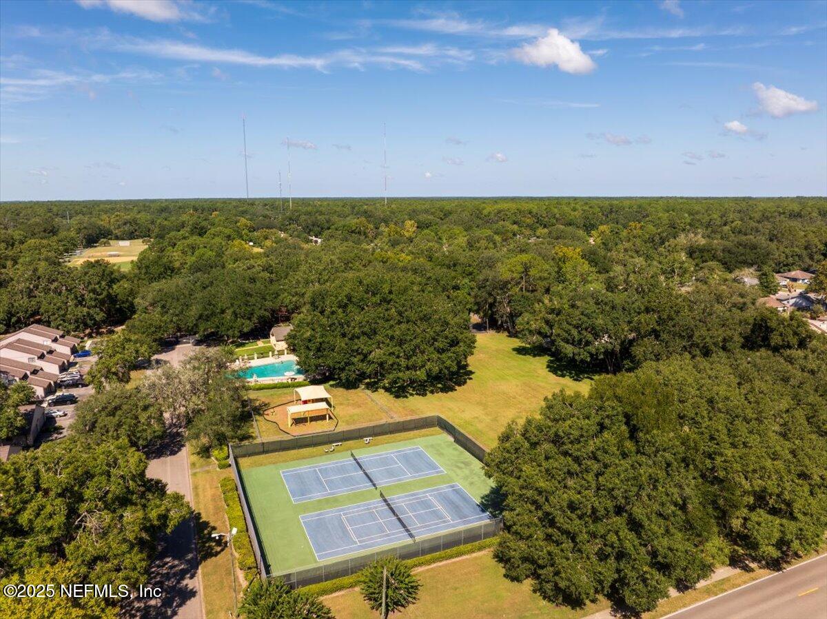 3726 Northwest 53rd Road Gainesville, FL 32653 - Photo 34 of 36 an aerial view of a house with a yard