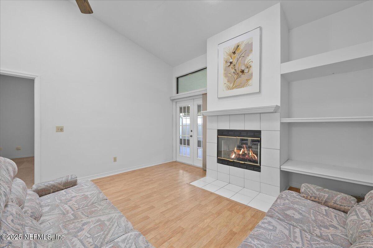 3726 Northwest 53rd Road Gainesville, FL 32653 - Photo 10 of 36 a view of a livingroom with a fireplace and window