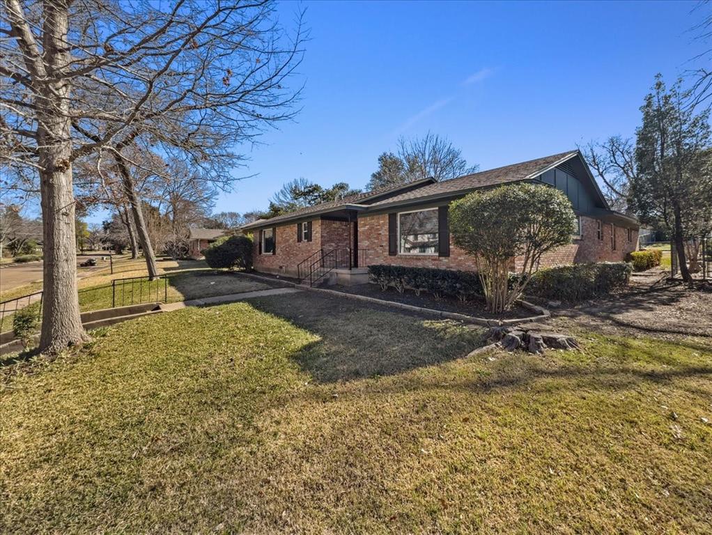 2709 Ripplewood Drive Dallas, TX 75228 - Photo 2 of 24 a view of a house with a yard
