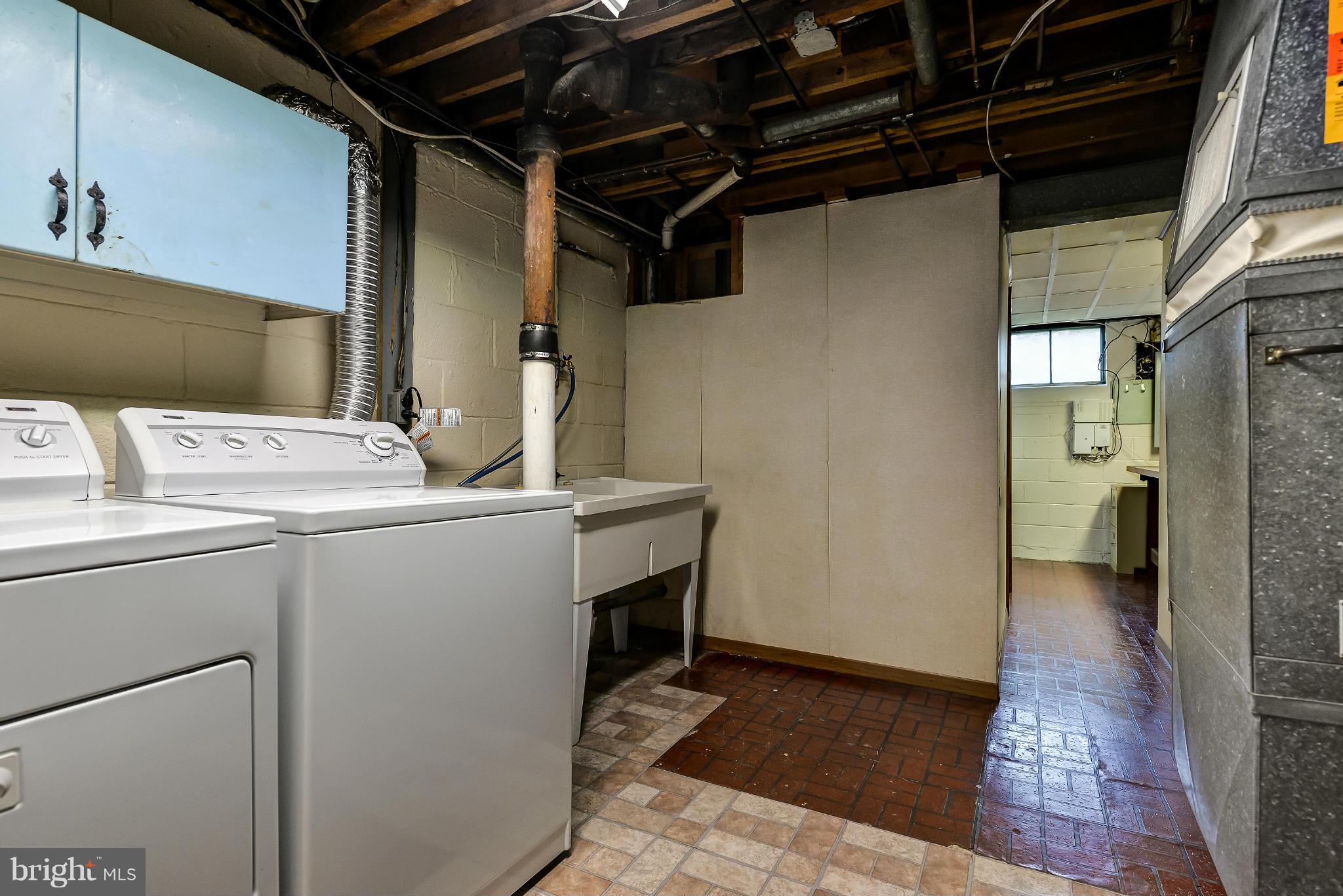 11809 Indigo Road Silver Spring, MD 20906 - Photo 27 of 30 a utility room with dryer and washer